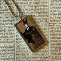 Vampire woman, vintage halloween illustrations, up-cycled to soldered glass pendant