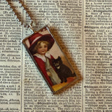 Witches, black cats, vintage halloween illustrations, up-cycled to soldered glass pendant