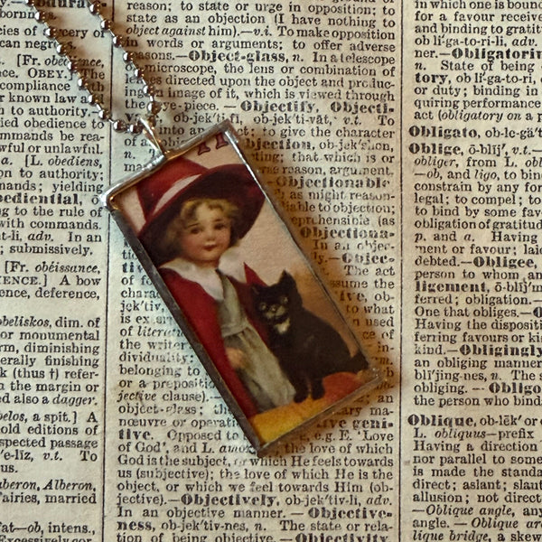 Witches, black cats, vintage halloween illustrations, up-cycled to soldered glass pendant