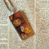 Witches, black cats, vintage halloween illustrations, up-cycled to soldered glass pendant