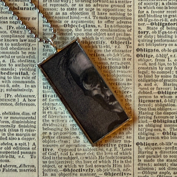 Inside Outside, Woman's face and skull, vintage halloween illustrations, up-cycled to soldered glass pendant