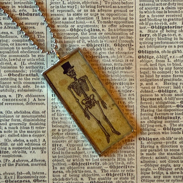 Skeletons, vintage illustrations upcycled to hand-soldered glass pendant