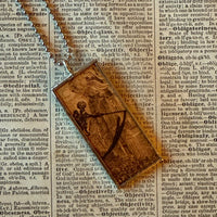 Skeletons, vintage illustrations upcycled to hand-soldered glass pendant