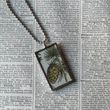 Pinecones, juniper, pine trees, botanical illustrations, up-cycled to soldered glass pendant