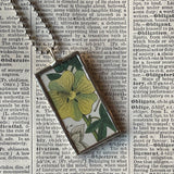 Yellow hibiscus, white lily, botanical illustrations, up-cycled to soldered glass pendant