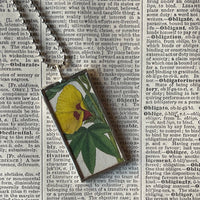 Yellow hibiscus, yellow cinquefoil flowers, botanical illustrations, up-cycled to soldered glass pendant