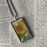 Yellow cinquefoil, purple hellebore flowers, botanical illustrations, up-cycled to soldered glass pendant