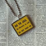 Go to Jail - vintage monopoly Chance card, upcycled to soldered hand-soldered glass pendant