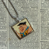 Fred Flintstone, vintage children's book illustrations, up-cycled to soldered glass pendant