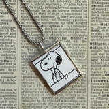 Snoopy, comic strip illustrations from vintage Peanuts book, up-cycled to hand-soldered glass pendant