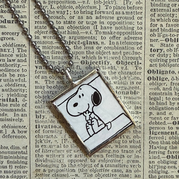 Snoopy, comic strip illustrations from vintage Peanuts book, up-cycled to hand-soldered glass pendant