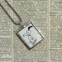 Snoopy, comic strip illustrations from vintage Peanuts book, up-cycled to hand-soldered glass pendant