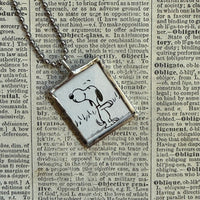Snoopy, comic strip illustrations from vintage Peanuts book, up-cycled to hand-soldered glass pendant