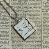Snoopy, comic strip illustrations from vintage Peanuts book, up-cycled to hand-soldered glass pendant