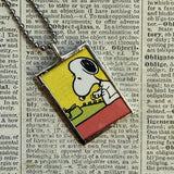Snoopy, comic strip illustrations from vintage Peanuts book, up-cycled to hand-soldered glass pendant