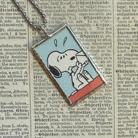 Snoopy, comic strip illustrations from vintage Peanuts book, up-cycled to hand-soldered glass pendant