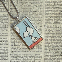 Snoopy, comic strip illustrations from vintage Peanuts book, up-cycled to hand-soldered glass pendant
