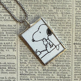 Snoopy, comic strip illustrations from vintage Peanuts book, up-cycled to hand-soldered glass pendant