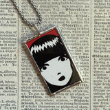 Emily the Strange, vintage illustrations up-cycled to soldered glass pendant