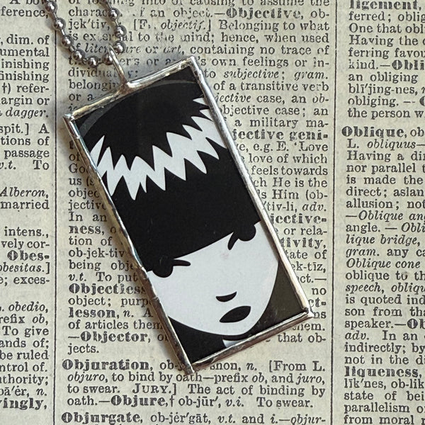 Emily the Strange, vintage illustrations up-cycled to soldered glass pendant