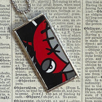 Emily the Strange, vintage illustrations up-cycled to soldered glass pendant
