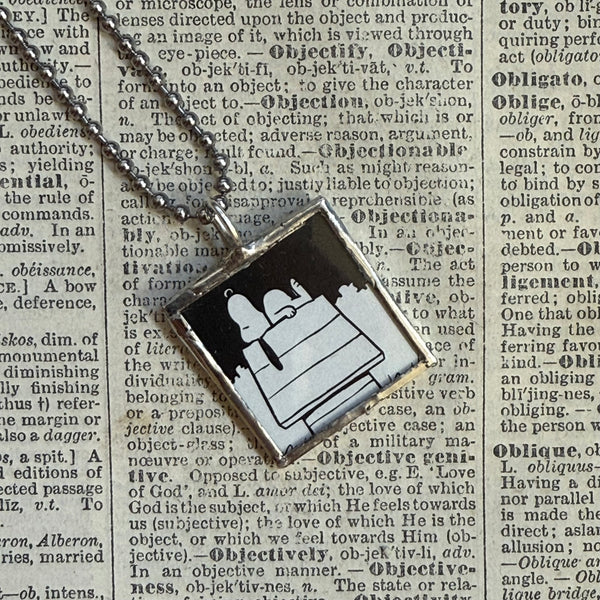 Snoopy, comic strip illustrations from vintage Peanuts book, up-cycled to hand-soldered glass pendant