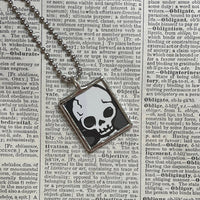 Skull and Flower, vintage illustrations up-cycled to soldered glass pendant