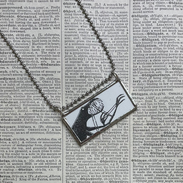 Gorey skeletons, vintage book illustrations, hand-soldered glass pendant