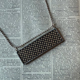 50 Cents, vintage Sears Catalog typography, upcycled to hand soldered glass pendant