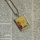Snoopy, comic strip illustrations from vintage Peanuts book, up-cycled to hand-soldered glass pendant