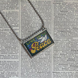 Live in Peace - 1970s stamp upcycled to hand soldered glass pendant