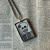 Skeleton / Skull, vintage illustrations up-cycled to soldered glass pendant