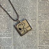 Snoopy, comic strip illustrations from vintage Peanuts book, up-cycled to hand-soldered glass pendant