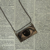 Human eye, vintage illustration upcycled to hand-soldered glass pendant