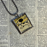 Snoopy, comic strip illustrations from vintage Peanuts book, up-cycled to hand-soldered glass pendant