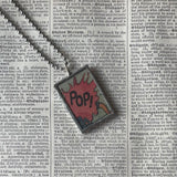 Crash! Pop!! onomatopoeia, vintage comic book illustration, upcycled to soldered glass pendant