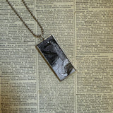 Gorey Doubtful Guest vintage book illustrations, hand-soldered glass pendant