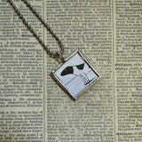 Gorey - Man in fur coat, dog Vintage book illustrations, hand-soldered glass pendant