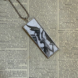 Gorey Demon / Insect vintage book illustrations, hand-soldered glass pendant