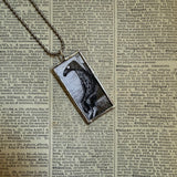Gorey Doubtful Guest vintage book illustrations, hand-soldered glass pendant