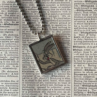 Bugs Bunny, Daffy Duck, vintage 1970s comic illustration, upcycled to soldered hand-soldered glass pendant