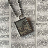 Bugs Bunny, Daffy Duck, vintage 1970s comic illustration, upcycled to soldered hand-soldered glass pendant