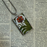 Red lily flowers, vintage art nouveau botanical illustrations, up-cycled to soldered glass pendant