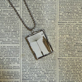 Poppy and dandelion seeds, botanical illustrations, up-cycled to soldered glass pendant