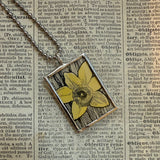 Forget me Not and daffodil flowers, botanical illustrations, up-cycled to soldered glass pendant