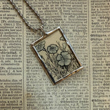 Forget me Not and daffodil flowers, botanical illustrations, up-cycled to soldered glass pendant
