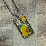 Yellow and red hibiscus, botanical illustrations, up-cycled to soldered glass pendant