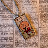 Snoopy, comic strip illustrations from vintage Peanuts book, up-cycled to hand-soldered glass pendant
