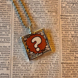 Poison skull and crossbones, question mark, vintage illustrations up-cycled to soldered glass pendant
