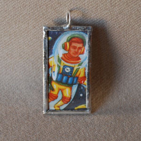 Astronaut, rocket, vintage cracker jack prize illustration